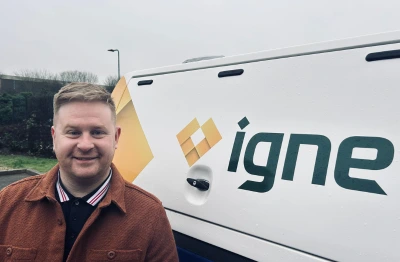 New Field Services Manager Ryan Hobson next to an Igne branded van